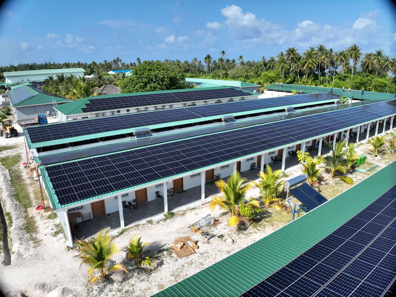 Aerial view of rooftop solar panels installed on a commercial building in Fiji